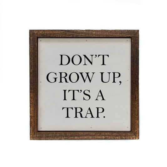 Don't Grow Up, It's A Trap 6x6 wood novelty sign